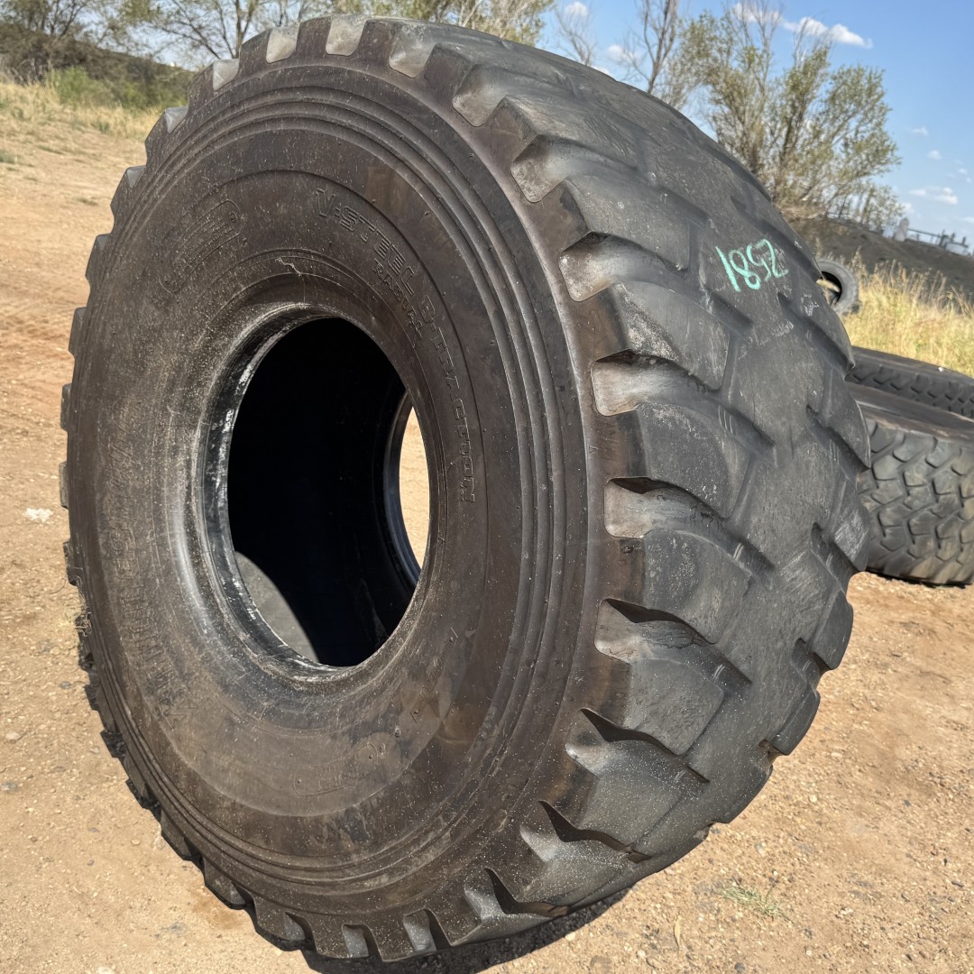 <font color='#da2127' font size ='2'><b>24R21 Bridgestone OTR Tire E-2 VGT 1-Star </font></b><br><font size ='1' color='grey'>CONDITION: </font><font size ='2'>Used<br><font size ='1' color='grey'>TREAD DEPTH:</font><font size ='2'> 11/32nds<br><font size ='1' color='grey'>DETAILS:</font><font size ='2'> Clean<br><font size ='1' color='grey'>REF #:</font><font size ='2'> Z581<br><font size ='1' color='grey'>LOCATION:</font><font size ='2'> Amarillo, TX