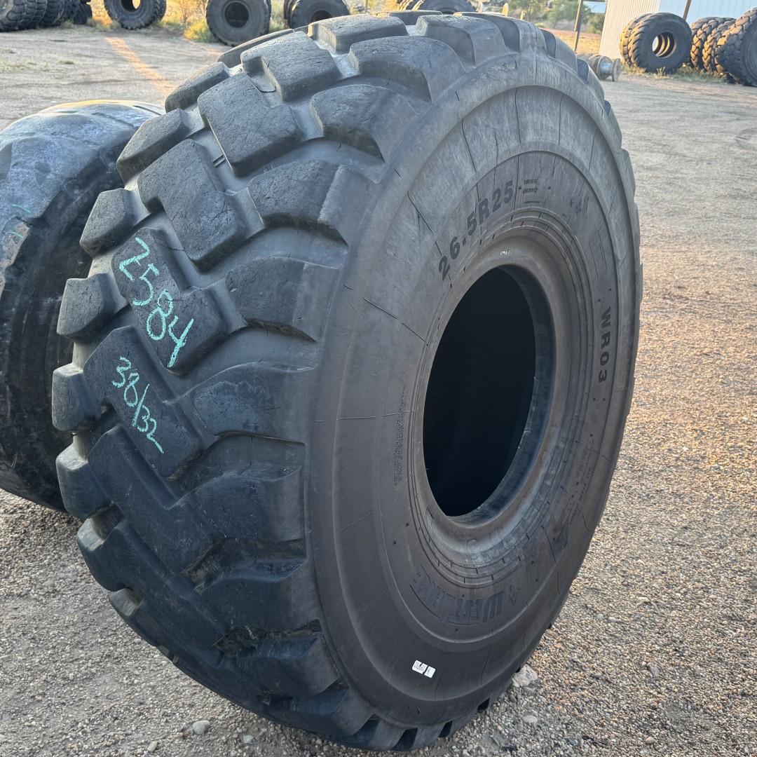 <font color='#da2127' font size ='2'><b>26.5R25 West Lake OTR Tire E-3 L-3 WR03 2-Star </font></b><br><font size ='1' color='grey'>CONDITION: </font><font size ='2'>Used<br><font size ='1' color='grey'>TREAD DEPTH:</font><font size ='2'> 38/32nds<br><font size ='1' color='grey'>DETAILS:</font><font size ='2'> Clean<br><font size ='1' color='grey'>REF #:</font><font size ='2'> Z584<br><font size ='1' color='grey'>LOCATION:</font><font size ='2'> Amarillo, TX