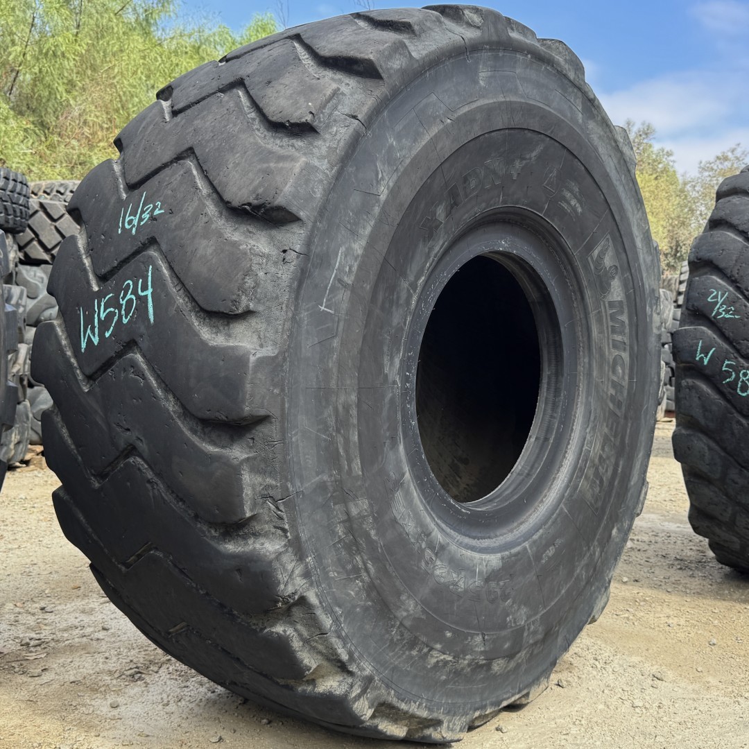 <font color='#da2127' font size ='2'><b>29.5R25 Michelin OTR Tire E-3 XADN+ 2-Star </font></b><br><font size ='1' color='grey'>CONDITION: </font><font size ='2'>Used<br><font size ='1' color='grey'>TREAD DEPTH:</font><font size ='2'> 16/32nds<br><font size ='1' color='grey'>DETAILS:</font><font size ='2'> Clean, Minor Shoulder Cuts<br><font size ='1' color='grey'>REF #:</font><font size ='2'> W584<br><font size ='1' color='grey'>LOCATION:</font><font size ='2'> Saskatoon, SK